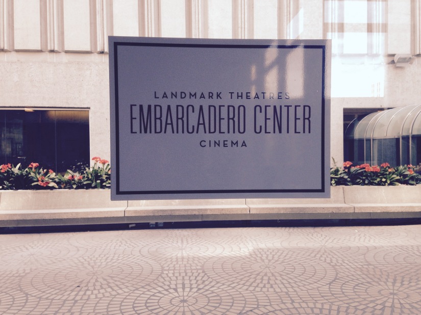 Embarcadero Landmark Theaters purple sign rectangle